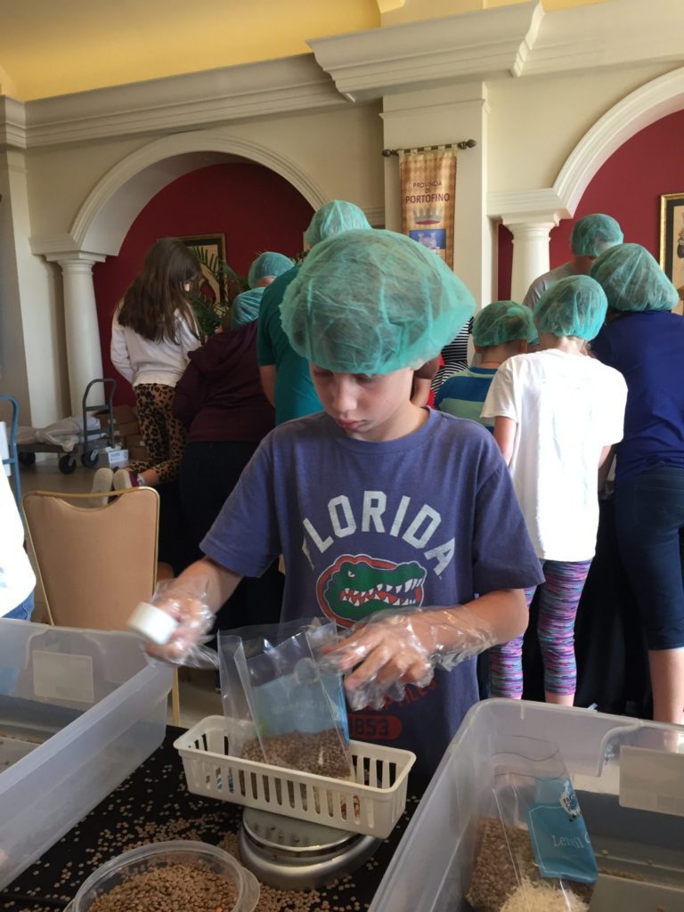 student packing food