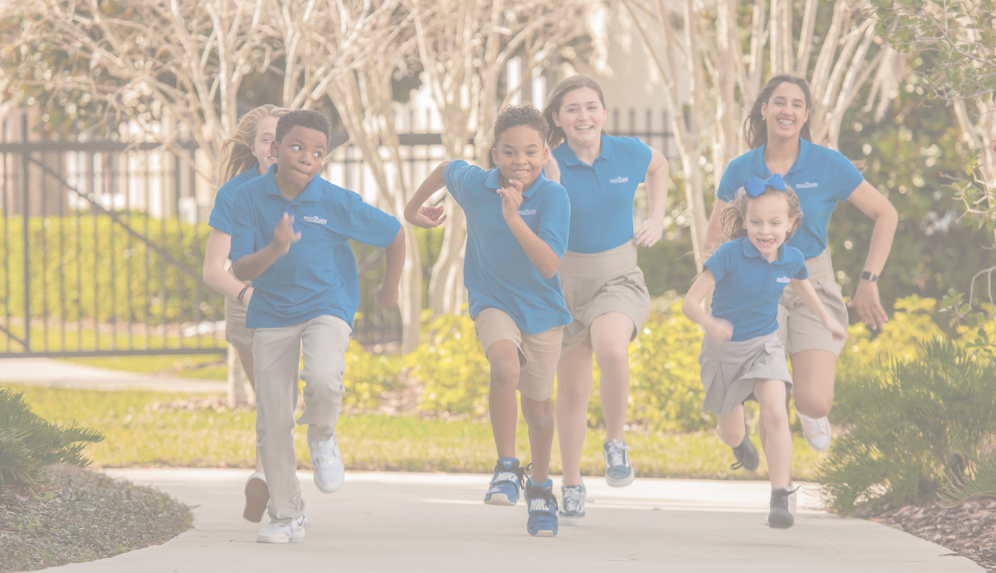 Several uniformed children running