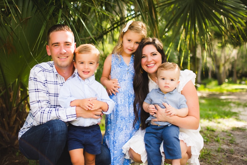 A happy TFA family in the palm trees